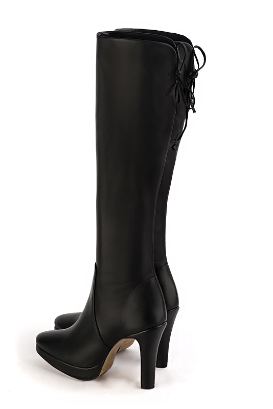 Satin black women's knee-high boots, with laces at the back. Round toe. Very high slim heel with a platform at the front. Made to measure. Rear view - Florence KOOIJMAN